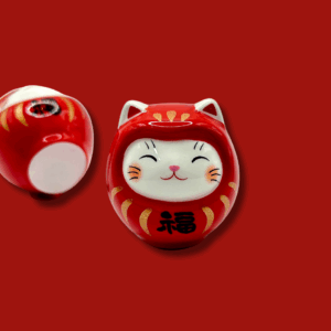 Omikuji Daruma Chat rouge en porcelaine.