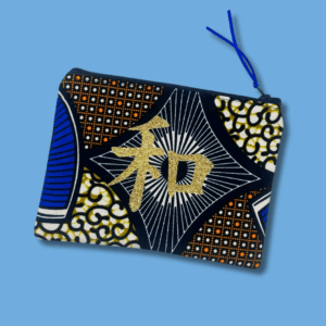 Trousse matelassée en wax, doublure kimono et Kanji pailleté doré