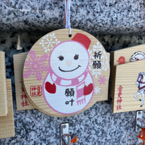 Ema ronde bonhomme de neige à dessiner (visage), rose - Hokkaido