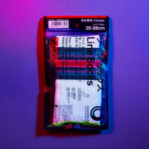 1 paire de Chaussettes Stranger Things blanche du Konbini FAMILY MART.